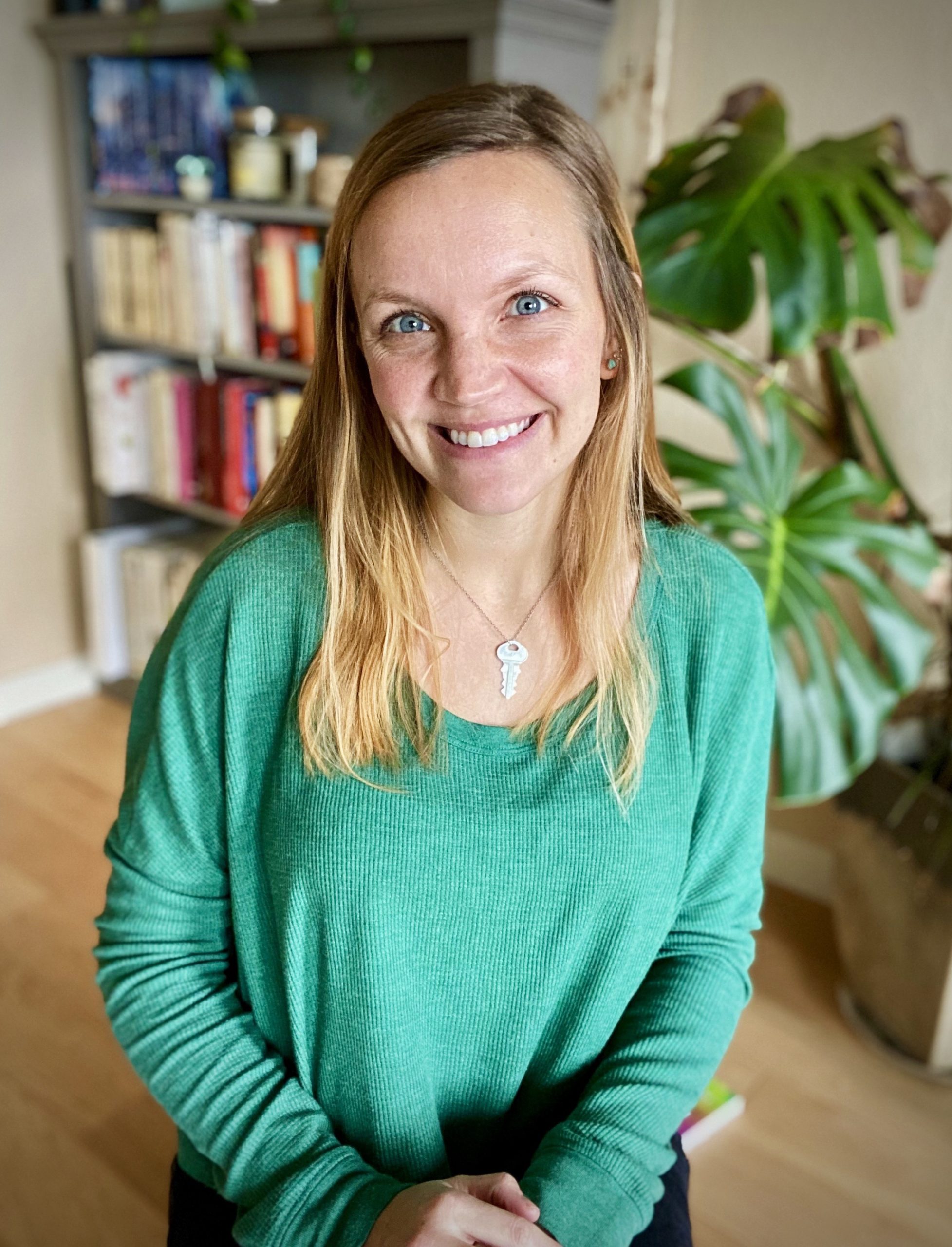 A woman smiling at the camera.
